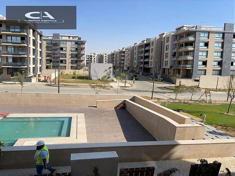 Ready to move own your apartment with a  roof, 4/3 finishing, in Azad Compound in the heart of Fifth Settlement A distinctive view of the lagoon 20