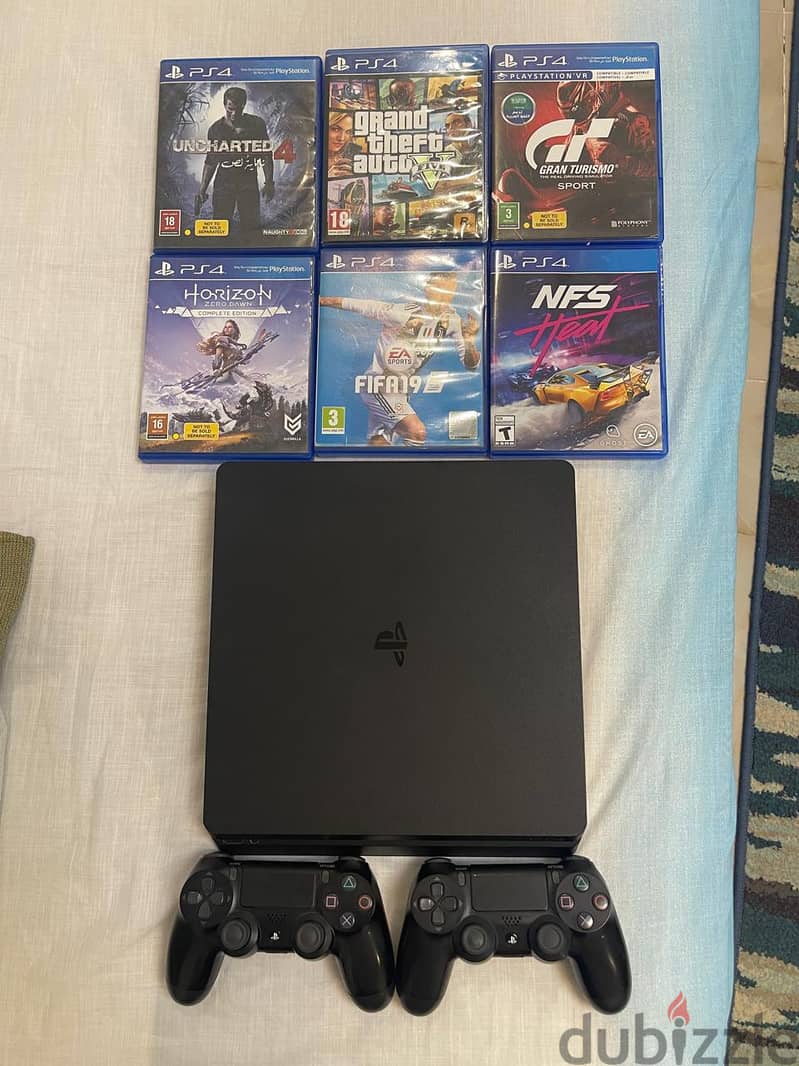 Playstation 4 PS4 1 TB بليستسشن وذراعين صليين و ست ألعاب 0