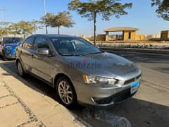 Mitsubishi Lancer 2015 بصمة و فتحة سقف