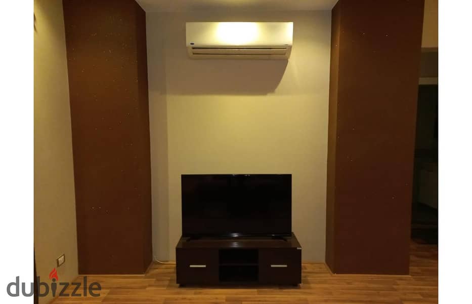 Studio 88m semi furnished for sale in village gate New Cairo. 2