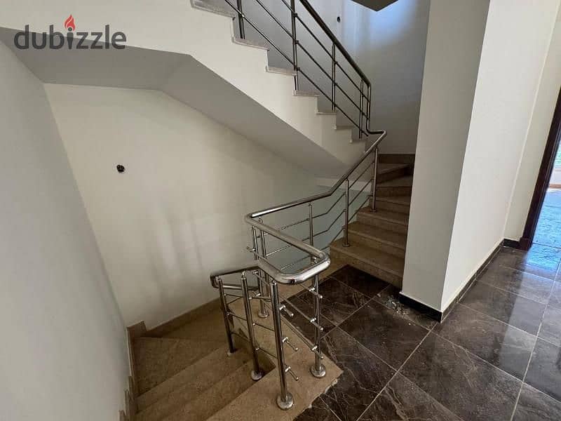 Townhouse for sale in Grand Heights Compound, Sheikh Zayed, lowest price within the compound 13