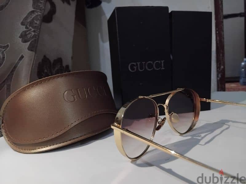 نظاره Gucci 1