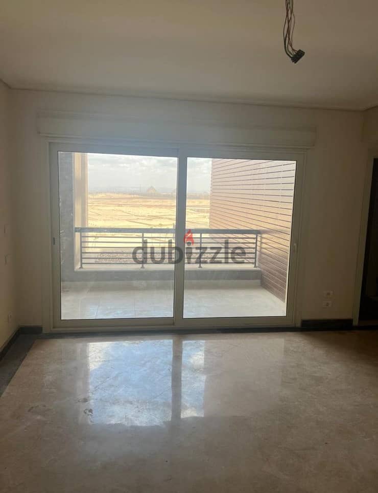 Apartment for rent at New Giza شقة للإيجار بكمبوند نيو جيزة موقع مميز 1