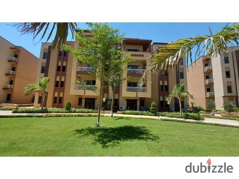 Apartment for sale in Green 5 Compound, Sheikh Zayed, with a distinctive view 2