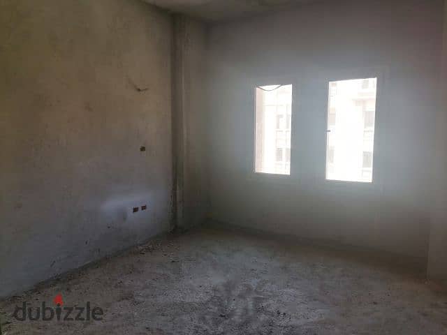 Apartment for sale in Green 5 Compound, Sheikh Zayed, with a distinctive view 9