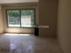 Ground apartment for sale in village gate  - New Cairo