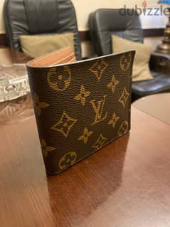 محفظة louis vuitton paris made in france