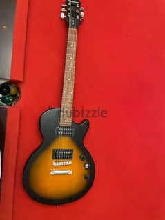 epihone les paul electric guitar with amp