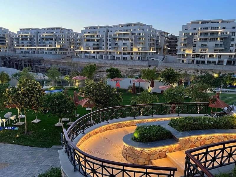 Immediate delivery of an apartment in Mountain View, Fifth Settlement, behind AUC and directly next to Palm Hills, minutes from Mivida, with a private 0