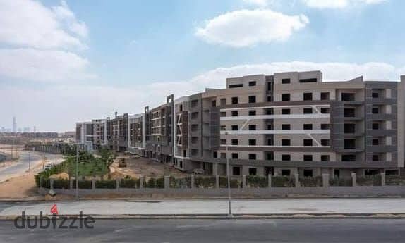 Own your apartment in a compound in front of Madinaty with an area of 70 acres with a down payment of 500 thousand over 72 months 1