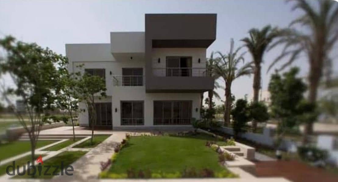 For sale, an independent villa in Grand Heights Compound, a unique location within the compound, on a landscaped landscape. The land area is 580 m and 7