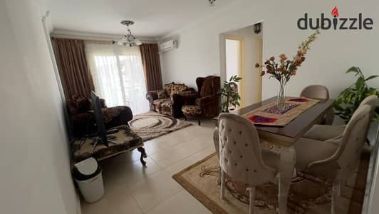 Furnished apartment for rent in Madinaty B12, great location, view garden, new furniture