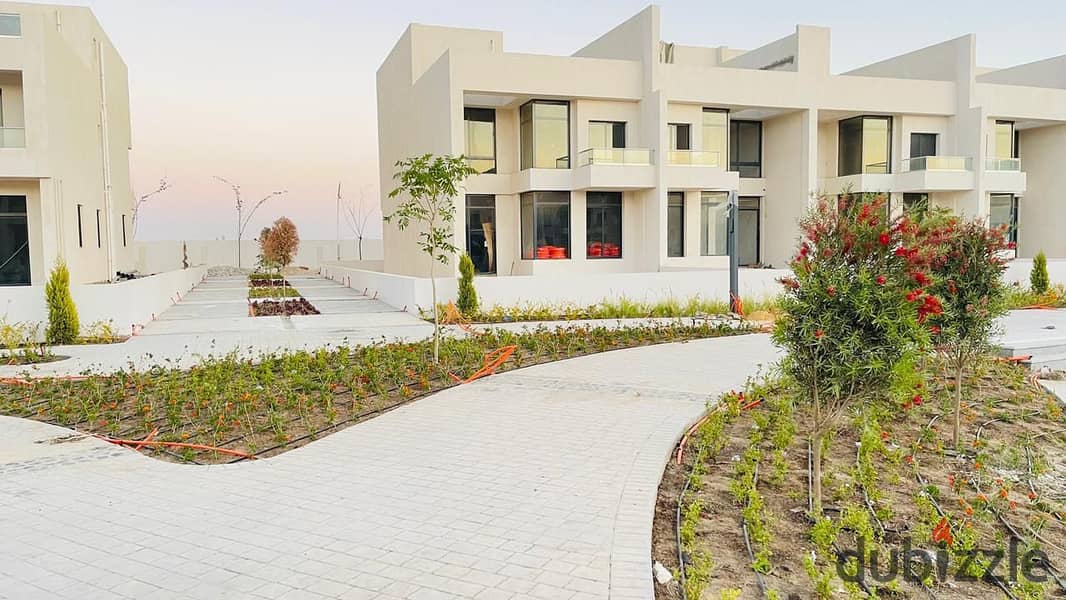 Own a 3-Story Villa with Installments in a Prime Location in Sheikh Zayed, Directly on Dahshur Link at Lake West 4