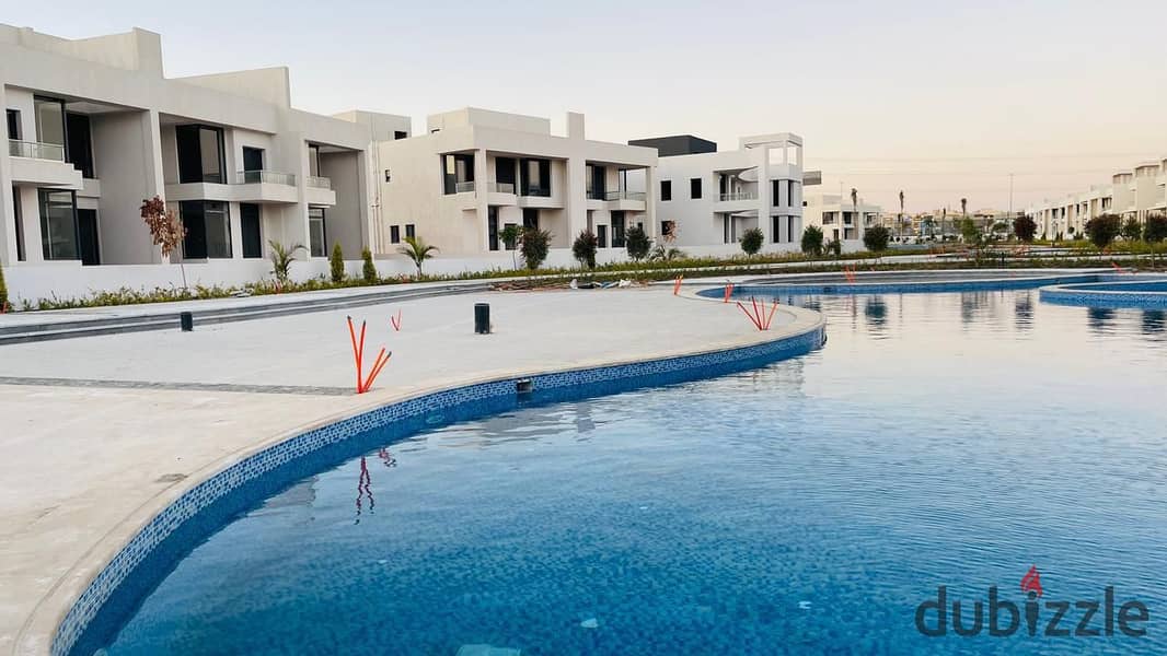 Own a 3-Story Villa with Installments in a Prime Location in Sheikh Zayed, Directly on Dahshur Link at Lake West 7