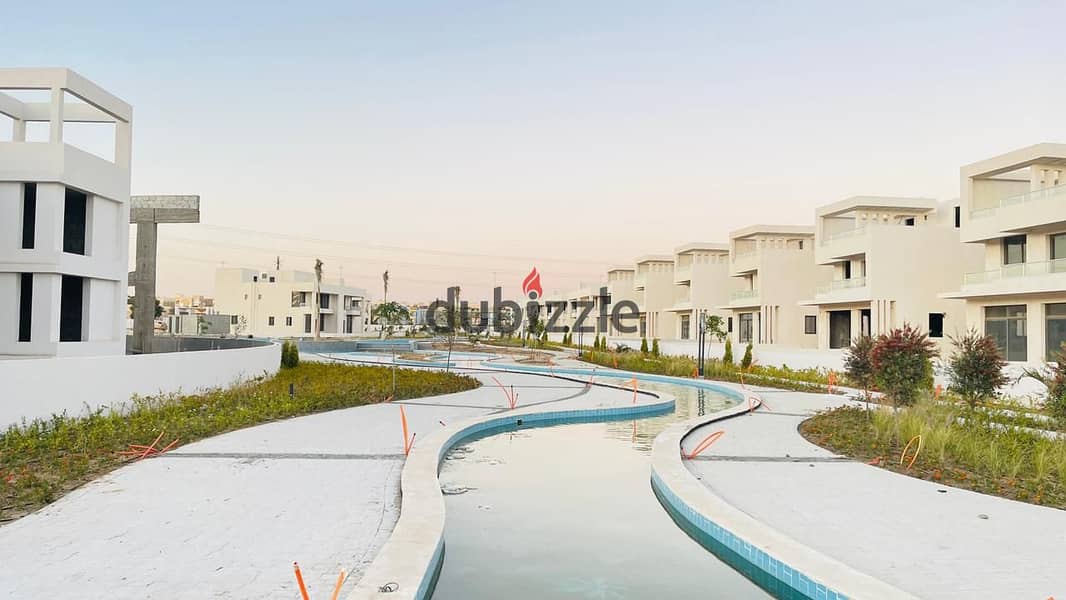 Own a 3-Story Villa with Installments in a Prime Location in Sheikh Zayed, Directly on Dahshur Link at Lake West 16