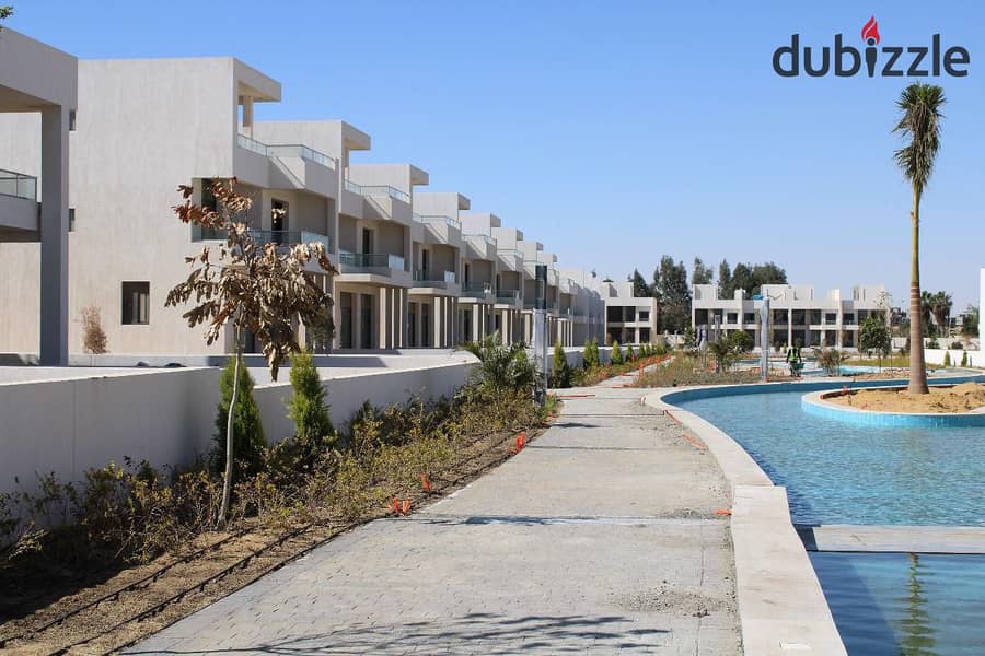 Own a 3-Story Villa with Installments in a Prime Location in Sheikh Zayed, Directly on Dahshur Link at Lake West 17