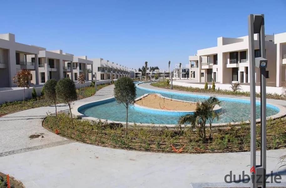 Own a 3-Story Villa with Installments in a Prime Location in Sheikh Zayed, Directly on Dahshur Link at Lake West 20