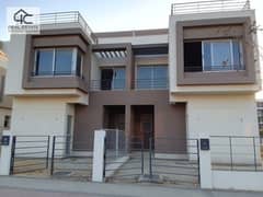 Twin house for sale, ready to move, open view on the largest landscape area, in a prime location in the heart of New Cairo