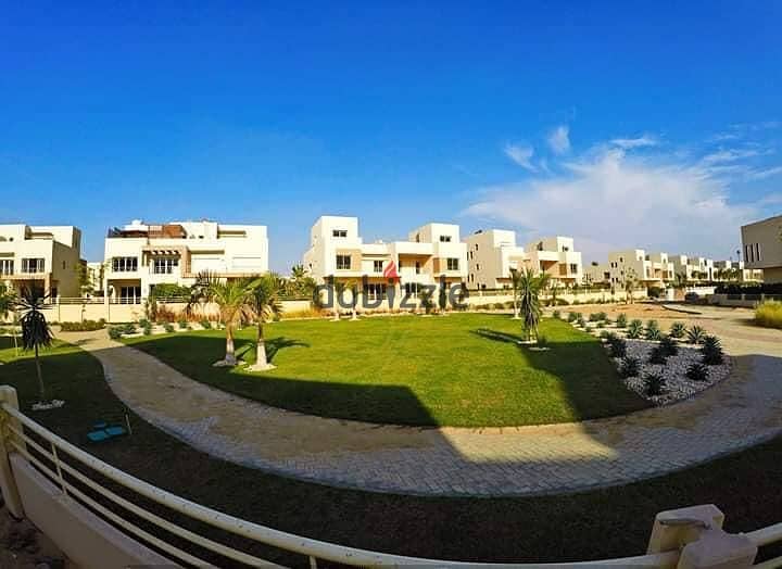 For sale, a resale villa, immediate delivery, finished, with a landscape view, in Grand Heights, Sheikh Zayed 5