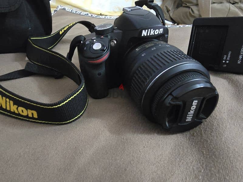 camera nikon d3200 with bag + lens + charger + memory card من السعوديه 0