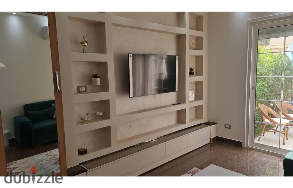 Studio 88m garden fully furnished for sale in compound regents Park New Cairo. 15