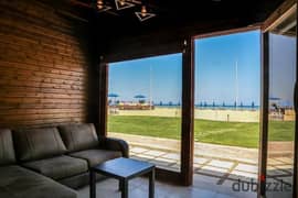 Ready to move and finished chalet for sale 3bed first row on the sea in front of area of windmills and near porto ain sokhna