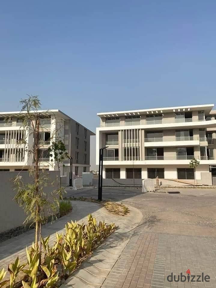 apartment with garden for sale ( installments up to 7 years ) in the eastern expansions between October and Zayed Joulz Compound next to New Giza 5