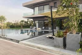 luxury villa for sale Swan Lake West Hassan Allam in the eastern expansions between October and Sheikh Zayed , next to New Giza