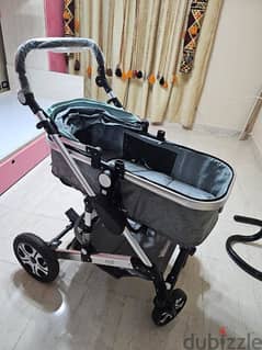 سترولر و كاريكوت stroller and carrycot ADAM'S