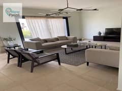 Apartment with garden for sale in Swan Lake Compound on Suez Road in front of Rehab