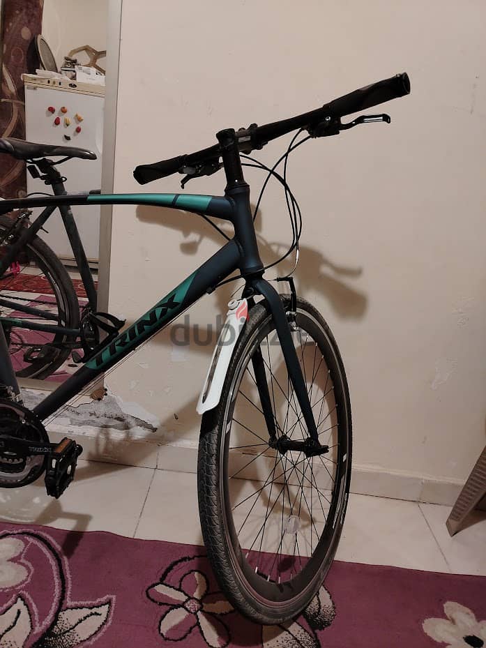 trinx free 1.0 hybrid bike 2