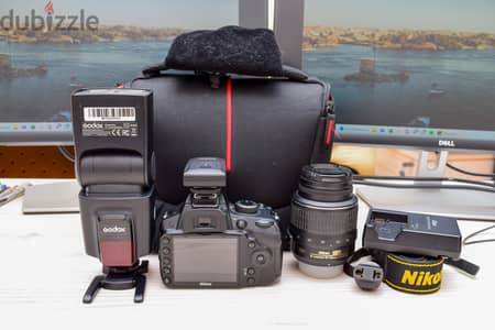 Nikon D3200 with Bag, Lens, Charger, Box and Speed light.