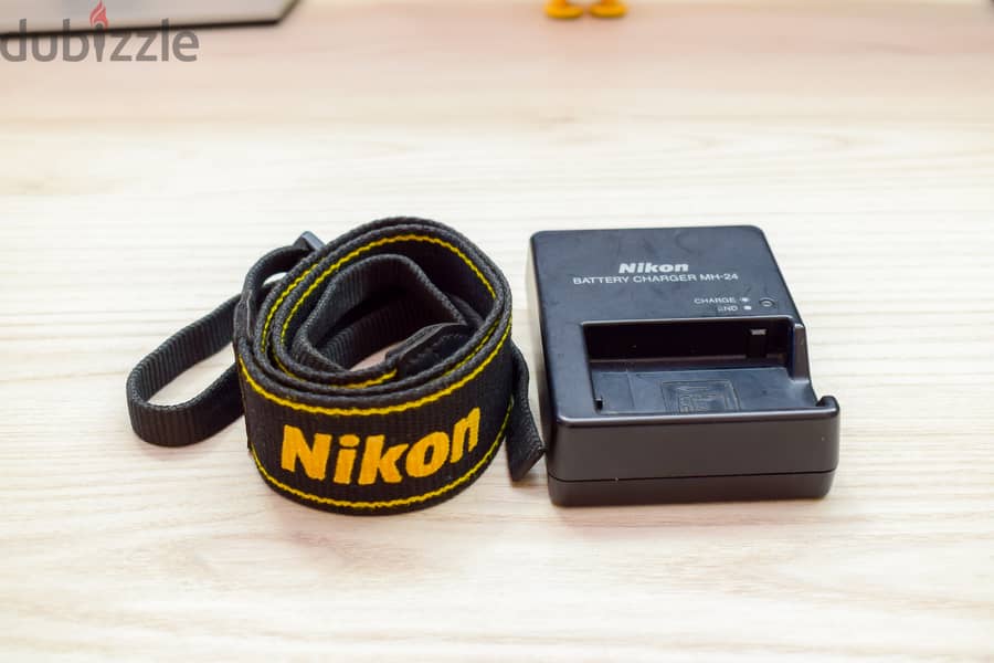 Nikon D3200 with Bag, Lens, Charger, Box and Speed light. 7