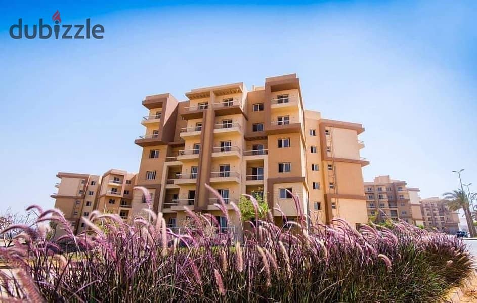 Apartment for sale in Ashgar City, with a view of green spaces and landscape, third floor, semi-finished, fastest delivery 9