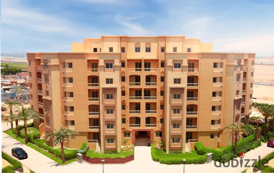 Apartment for sale in Ashgar City in installments, two rooms with a distinctive view of the garden and trees and next to all the compound services 10