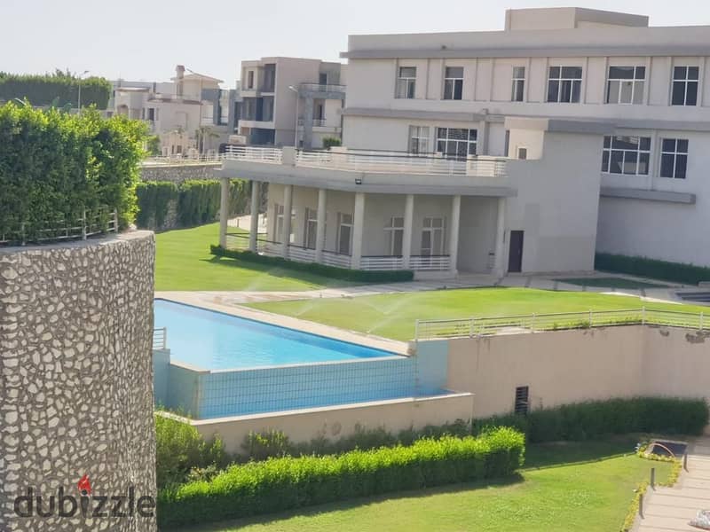 villa for sale in Al Karma 4 compound, next to Al Rabwa, with a distinctive view 0