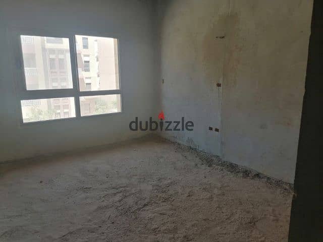 Apartment for sale in Green 5 Compound, Sheikh Zayed, with a distinctive view 7