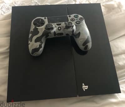 PlayStation 4 with controller