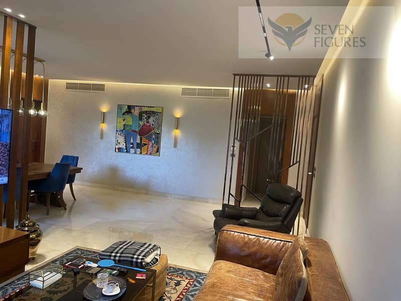 Apartment with Garden for sale in eastown new cairo fully finished ready to move 1