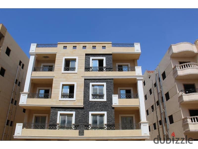 ground apartment for sale 3 rooms down payment 35% and installments over 48 months north of Beit Al Watan Fifth Settlement 11