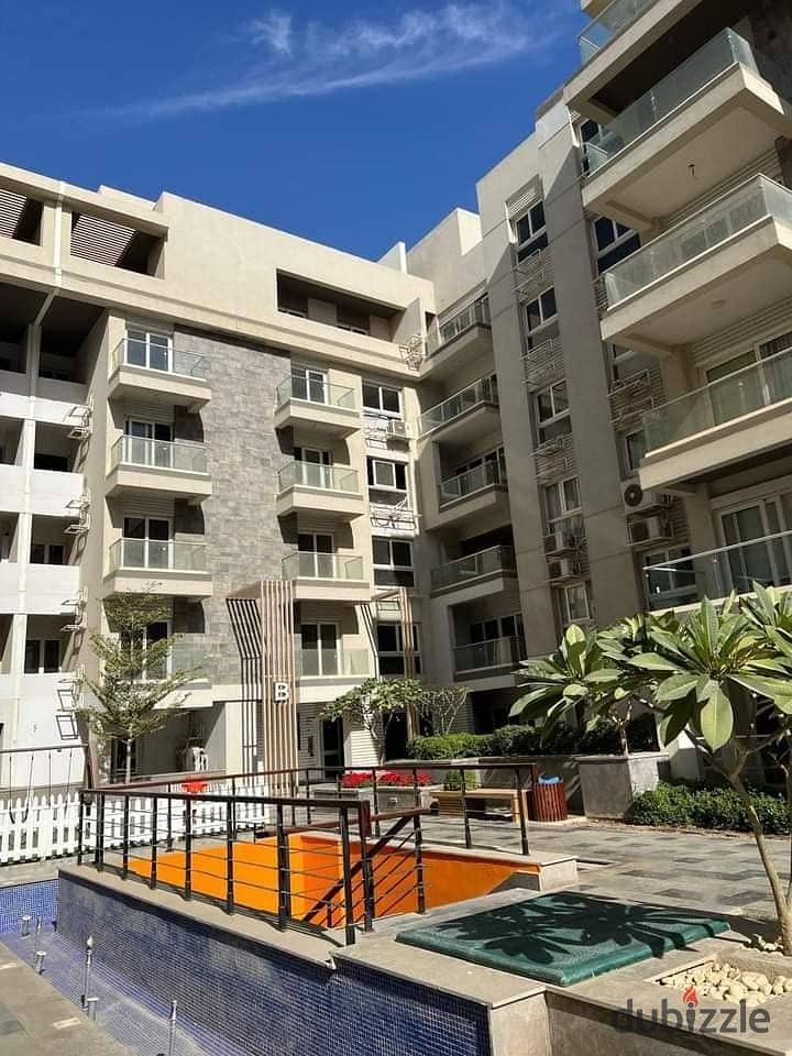 Apartment  directly next to Palm Hills  immediate delivery from Mountain View iCity  in the heart of the compound  minutes from Mivida a 2