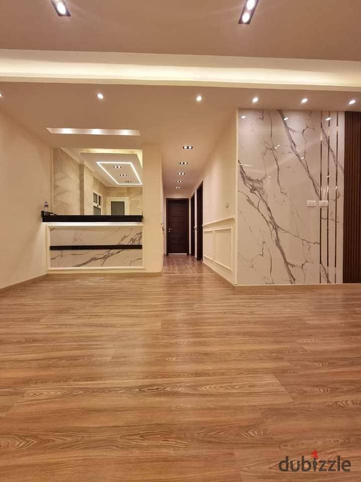 Apartment for sale + Garden directly in front of Cairo International Airport in Taj City Compound in Heliopolis on the extension of El Thawra Street 2