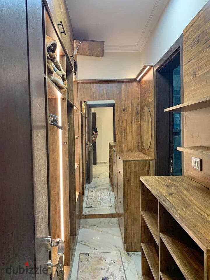 Apartment for sale + Garden directly in front of Cairo International Airport in Taj City Compound in Heliopolis on the extension of El Thawra Street 7