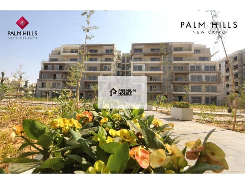 4-room apartment with garden, immediate delivery, landscape view, excellent location in Palm Hills New Cairo Compound. 1