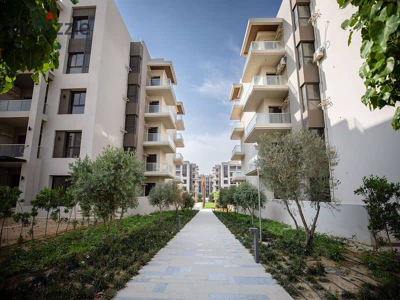 Fully finished apartment for sale 121m2 with 2 bedrooms in a compound with green spaces and perfect landscaping in the heart of the 5th settlement 2