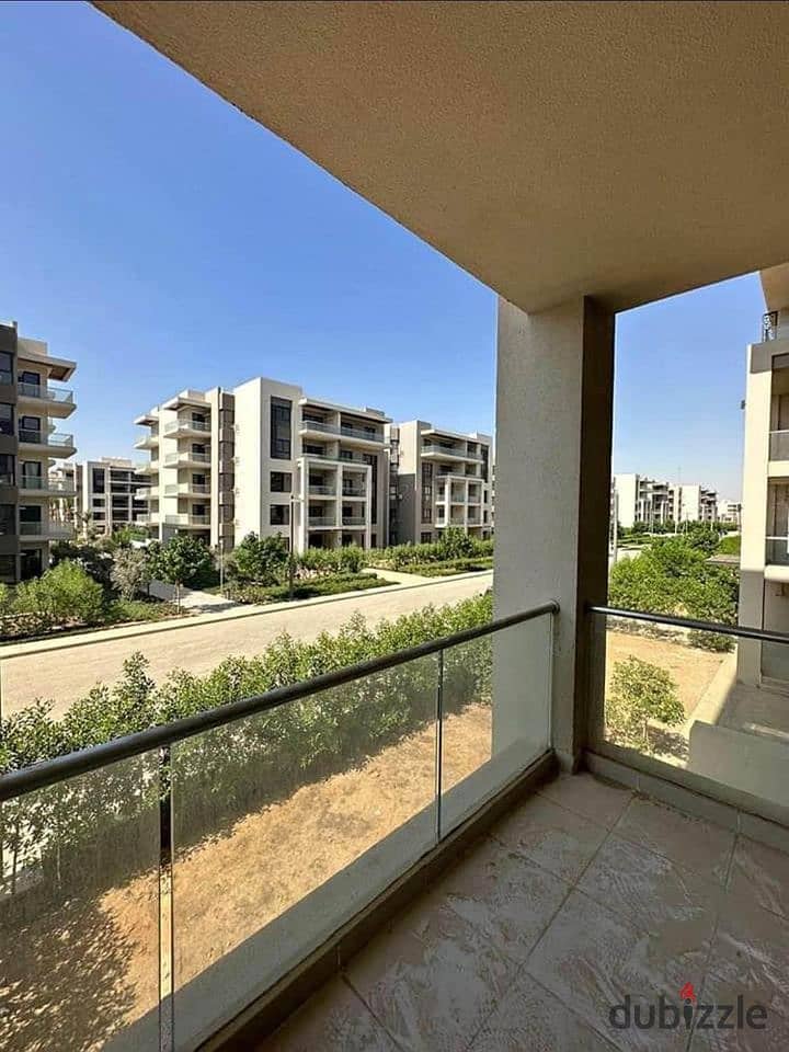 Fully finished apartment for sale 121m2 with 2 bedrooms in a compound with green spaces and perfect landscaping in the heart of the 5th settlement 9