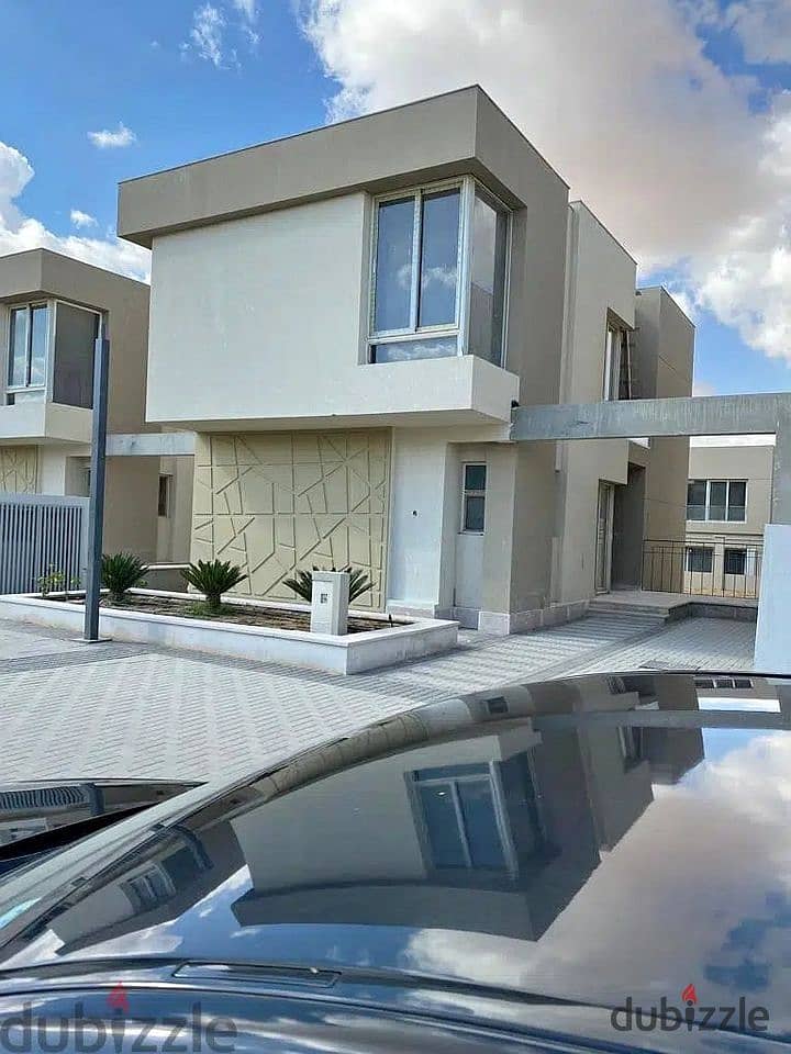 Villa for sale in October, Badya Compound, on Al Wahat Road, in front of Media Production City 9