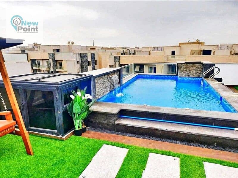 For sale, an apartment with immediate delivery, 133 m, next to the American University AUC, in a fully serviced compound in the Fifth Settlement 8