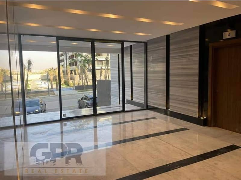 For sale, an apartment with an area of ​​240 square meters in Patio Oro Compound in the Fifth Settlement 4