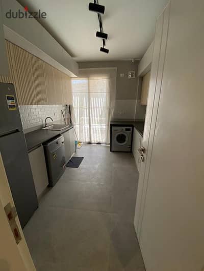 fully finished apartment with air conditioners, in Village West El Sheikh Zayed with option for delivery